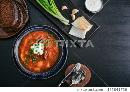 Bowl of red beetroot soup borscht with white cream Bowl of red beetroot soup borscht with white cream 135841766