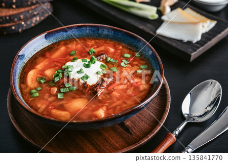 Bowl of red beetroot soup borscht with white cream Bowl of red beetroot soup borscht with white cream 135841770