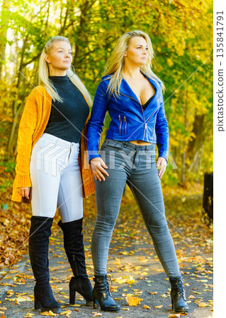 Females wearing fashionable autumn outfits Females wearing fashionable autumn outfits 135841791