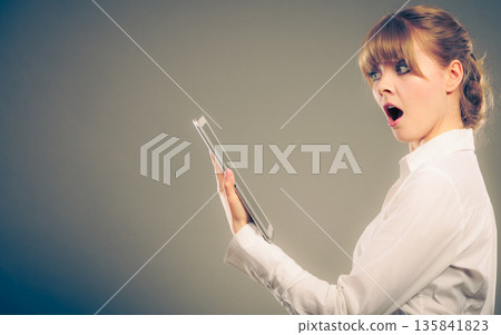 Woman reading learning with ebook. Education Woman reading learning with ebook. Education 135841823