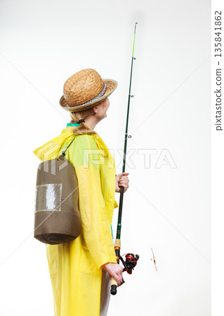 Woman with fishing rod, spinning equipment Woman with fishing rod, spinning equipment 135841862