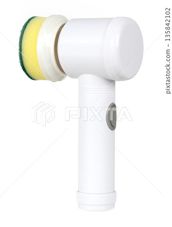 Handheld electric spin scrubber with a sponge attachment on a white background. Cordless cleaning tool for household hygiene. 135842102