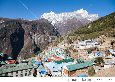 Namche Bazar town view with Kongde Ri peak in the background, Nepal Namche Bazar town view with Kongde Ri peak in the background, Nepal 135842262