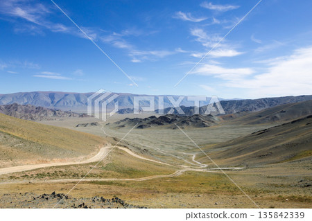 Landscape with dirt road in Altai Tavan Bogd National Park, Mongolia Landscape with dirt road in Altai Tavan Bogd National Park, Mongolia 135842339
