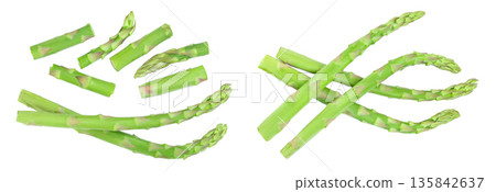 Fresh sprouts of asparagus isolated on white background. Top view. Flat lay Fresh sprouts of asparagus isolated on white background. Top view. Flat lay 135842637
