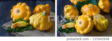 three yellow pattypan squash with leaf and flower on a dark wooden table 135842646