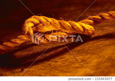 Golden Rope Knot Close-Up Macro Photography Golden Rope Knot Close-Up Macro Photography 135843077