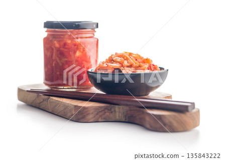 Fermented cabbage. Kimchi. Korean food in bowl isolated on white background. 135843222