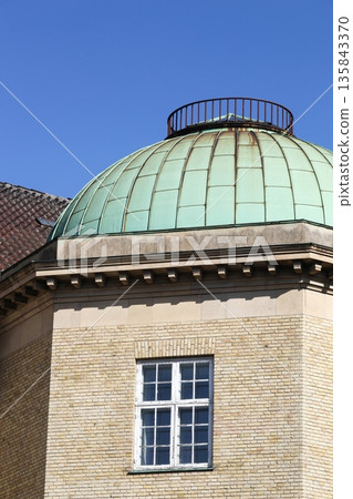 Danish post and telegraph building with a copper roof in Aarhus, Denmark Danish post and telegraph building with a copper roof in Aarhus, Denmark 135843370