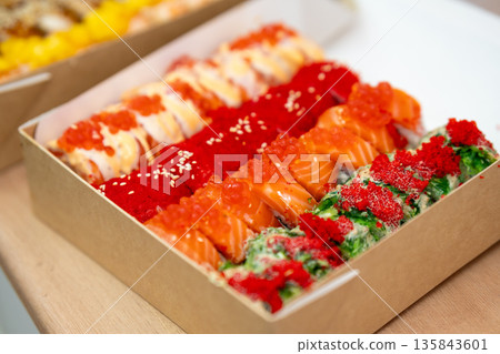 Assorted colorful sushi roll selection with salmon, caviar and seaweed salad Assorted colorful sushi roll selection with salmon, caviar and seaweed salad 135843601