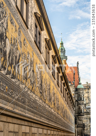 A large mural The Procession of Princes shows the mounted rulers of Saxony in Dresden. The artwork stretches along a wall, capturing historical figures in a procession A large mural The Procession of Princes shows the mounted rulers of Saxony in Dresden. The artwork stretches along a wall, capturing historical figures in a procession 135843638