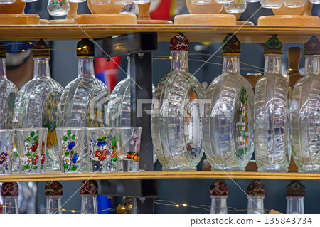 Traditional brandy empty bottles 135843734