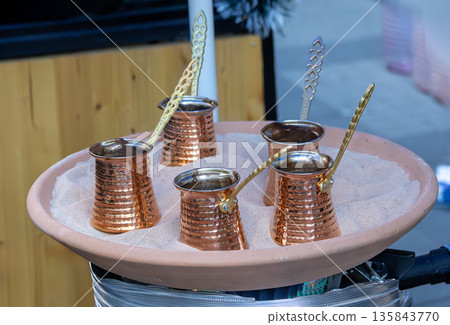 Gold Turkish coffee pots Gold Turkish coffee pots 135843770