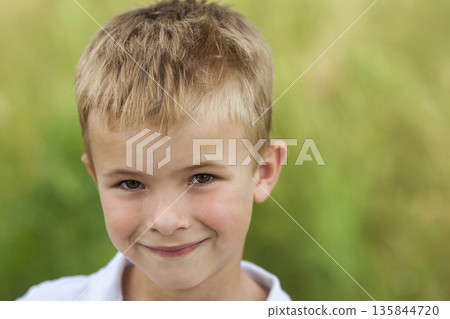 Portrait of a little smiling boy with golden blonde straw hair i Portrait of a little smiling boy with golden blonde straw hair i 135844720