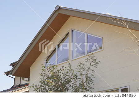 Exterior of a newly built two-story house Exterior of a newly built two-story house 135844880