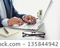 Businessman, accountant working in office 135844942
