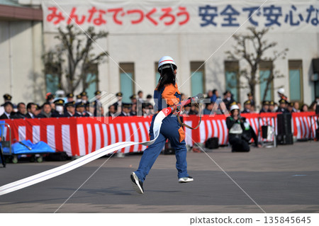 Kobe City Fire Department New Year's Parade - Fire drill by the Disaster Prevention Junior Team Kobe City Fire Department New Year's Parade - Fire drill by the Disaster Prevention Junior Team 135845645