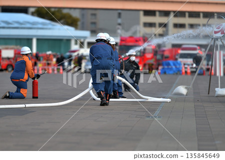 Kobe City Fire Department New Year's Parade - Fire drill by the Disaster Prevention Junior Team Kobe City Fire Department New Year's Parade - Fire drill by the Disaster Prevention Junior Team 135845649