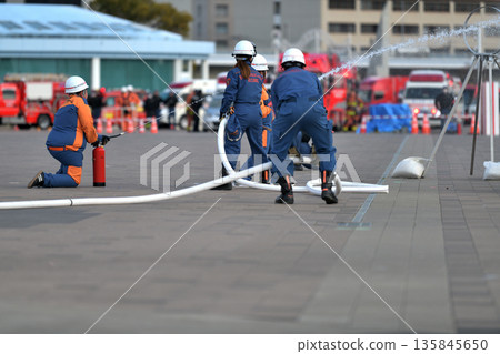 Kobe City Fire Department New Year's Parade - Fire drill by the Disaster Prevention Junior Team 135845650