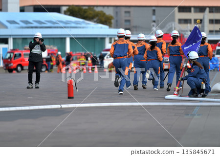 Kobe City Fire Department New Year's Parade - Fire drill by the Disaster Prevention Junior Team Kobe City Fire Department New Year's Parade - Fire drill by the Disaster Prevention Junior Team 135845671