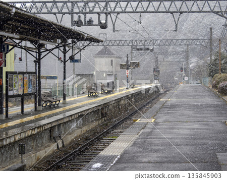 Snowing station scene Snowing station scene 135845903