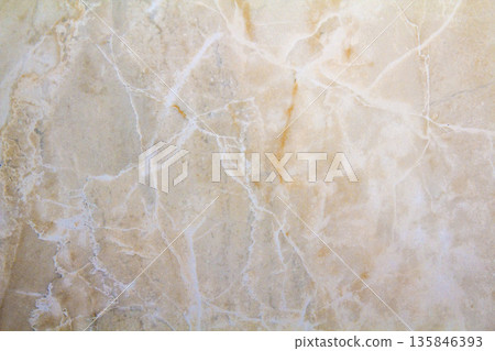 Closeup surface of marble pattern at the marble floor texture background , yellow abstract marble pattern Closeup surface of marble pattern at the marble floor texture background , yellow abstract marble pattern 135846393