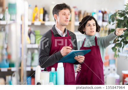 Two sellers take inventory 135847964