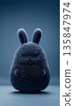 Grumpy fluffy bunny character on dark blue background 135847974