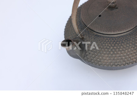 An old Nambu iron kettle that has been left unused for a long time and is starting to rust. An old Nambu iron kettle that has been left unused for a long time and is starting to rust. 135848247