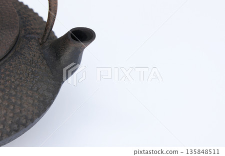 An old Nambu iron kettle that has been left unused for a long time and is starting to rust. An old Nambu iron kettle that has been left unused for a long time and is starting to rust. 135848511