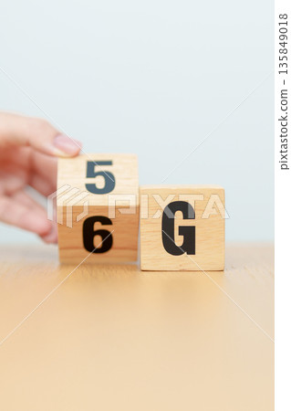 hand change wooden block from 5G to 6G, Generation of Cellular Mobile Communications, Technology, network, Social media and digital concepts hand change wooden block from 5G to 6G, Generation of Cellular Mobile Communications, Technology, network, Social media and digital concepts 135849018