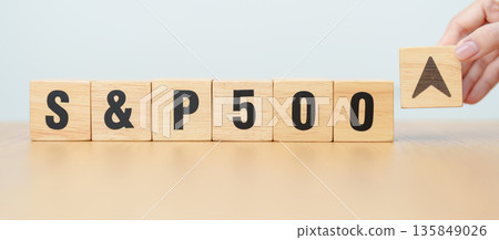 Hand change wooden block of SP500 text to UP and Down arrow symbol icon. stock market index, trade, trade company in the United States, financial growth and Cut loss concept Hand change wooden block of SP500 text to UP and Down arrow symbol icon. stock market index, trade, trade company in the United States, financial growth and Cut loss concept 135849026