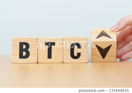 Hand change Wooden block with BTC or Bitcoin text to UP and Down arrow symbol. cryptocurrency, blockchain, price, down and up, decrease and increase, cut loss, trade and financial concepts Hand change Wooden block with BTC or Bitcoin text to UP and Down arrow symbol. cryptocurrency, blockchain, price, down and up, decrease and increase, cut loss, trade and financial concepts 135849035