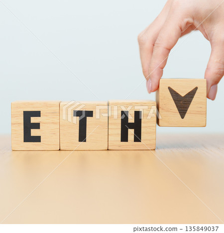 Hand change Wooden block with ETH or Ethereum text to UP and Down arrow symbol. cryptocurrency, blockchain, price, down and up, decrease and increase, cut loss, trade and financial concepts Hand change Wooden block with ETH or Ethereum text to UP and Down arrow symbol. cryptocurrency, blockchain, price, down and up, decrease and increase, cut loss, trade and financial concepts 135849037