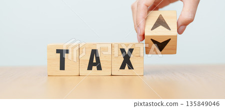 hand change wooden block with TAX text to UP and Down arrow icon. decrease and Increase, Taxpayer, Taxable Income, Tax Filing, Deduction, Withholding Tax, WHT, VAT, Computation and Exemption concept hand change wooden block with TAX text to UP and Down arrow icon. decrease and Increase, Taxpayer, Taxable Income, Tax Filing, Deduction, Withholding Tax, WHT, VAT, Computation and Exemption concept 135849046