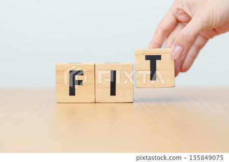 wooden block FIT. Fitness, Exercise, Healthy, Wellness, motivation and wellbeing concepts wooden block FIT. Fitness, Exercise, Healthy, Wellness, motivation and wellbeing concepts 135849075