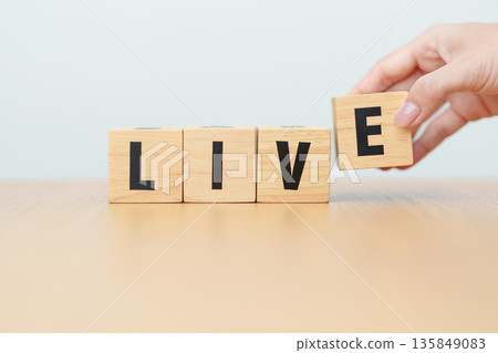 hand change wooden block Live to Life. Lifestyle, Live your life, learning, motivation and mindset concepts hand change wooden block Live to Life. Lifestyle, Live your life, learning, motivation and mindset concepts 135849083