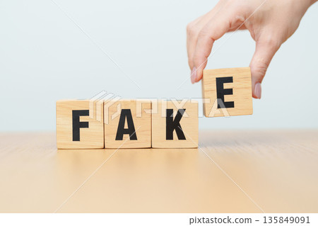 wooden block FAKE . rumor News, false, myth, evidence and disinformation concepts wooden block FAKE . rumor News, false, myth, evidence and disinformation concepts 135849091