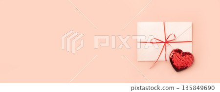 Valentine's envelope with red heart and ribbon Valentine's envelope with red heart and ribbon 135849690