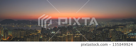 Jan 18 2026 Twilight glow spreads across Kowloon skyline from Tai Sheung Tok 135849924