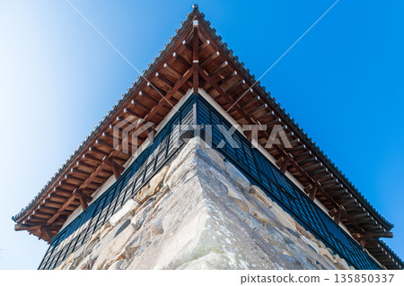 A view of the Otemuki Tower from below with a blue sky in the background A view of the Otemuki Tower from below with a blue sky in the background 135850337