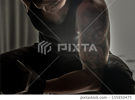 Closeup of Strong bodybuilder, power athletic man in training pumping up muscles with dumbbell. Closeup of Strong bodybuilder, power athletic man in training pumping up muscles with dumbbell. 135850475