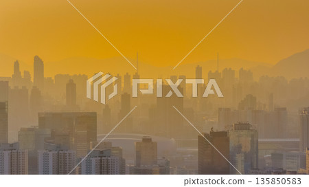 Jan 18 2026 Hazy polluted air drifting across Kowloon urban skyline 135850583