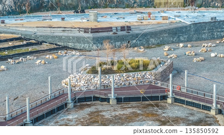 Jan 18 2026 Modern flood retention basin in green suburban park. Jan 18 2026 Modern flood retention basin in green suburban park. 135850592