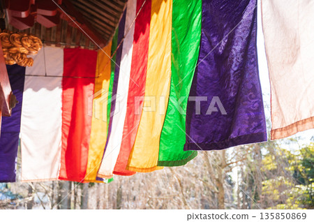 A tranquil space decorated with five-colored curtains at a Buddhist temple A tranquil space decorated with five-colored curtains at a Buddhist temple 135850869