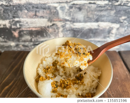 Karasumi chazuke is a dish of seasoned dried mullet roe and rice poured over dashi. Karasumi chazuke is a dish of seasoned dried mullet roe and rice poured over dashi. 135851596
