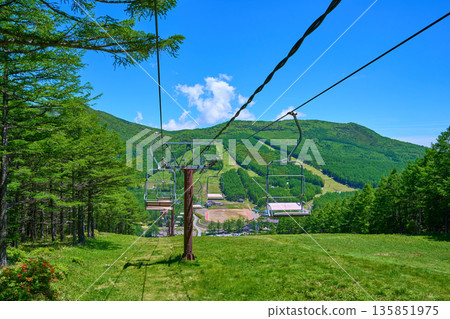 View of Yunomaru Kogen Ski Resort and tourist facilities from the sightseeing lift at Jizo Pass in Tomi City, Nagano Prefecture (Tsumagoi Village, Gunma Prefecture) in early summer View of Yunomaru Kogen Ski Resort and tourist facilities from the sightseeing lift at Jizo Pass in Tomi City, Nagano Prefecture (Tsumagoi Village, Gunma Prefecture) in early summer 135851975