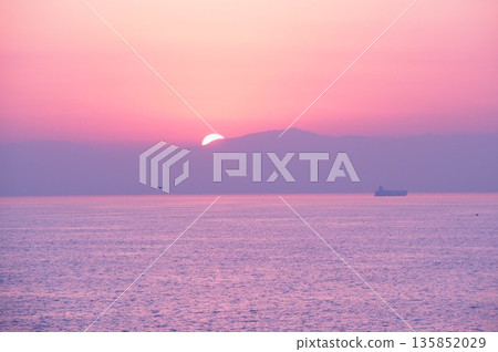 Beautiful sunrise seen from the ferry Beautiful sunrise seen from the ferry 135852029