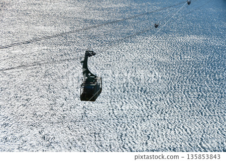 Ropeway over the lake 135853843