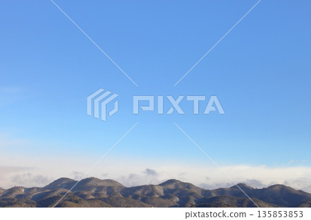 Misted mountains and blue skies as spring approaches Misted mountains and blue skies as spring approaches 135853853
